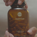 Video of SuperCell jar being opened, capsules being poured into hand, then put into a mouth and swallowed with a glass of water